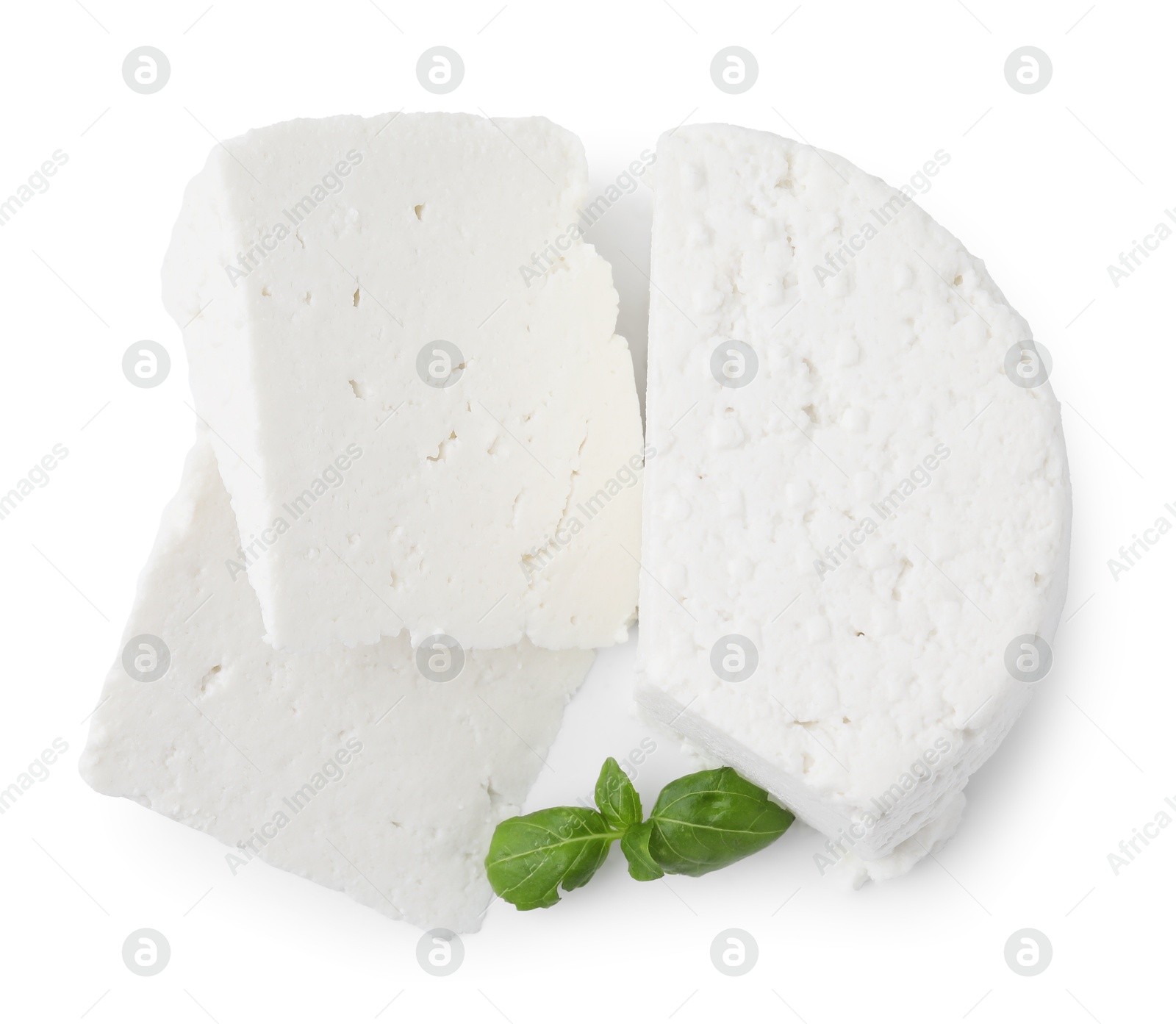 Photo of Fresh ricotta (cream cheese) and basil isolated on white, top view