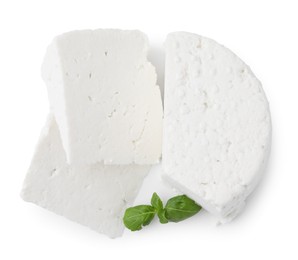 Photo of Fresh ricotta (cream cheese) and basil isolated on white, top view