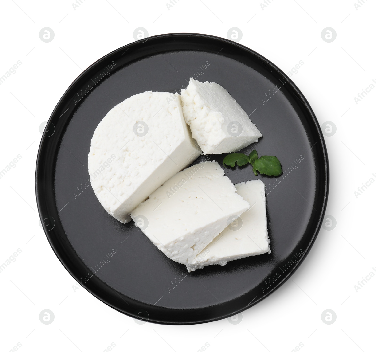 Photo of Fresh ricotta (cream cheese) and basil isolated on white, top view