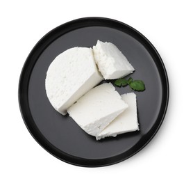 Photo of Fresh ricotta (cream cheese) and basil isolated on white, top view