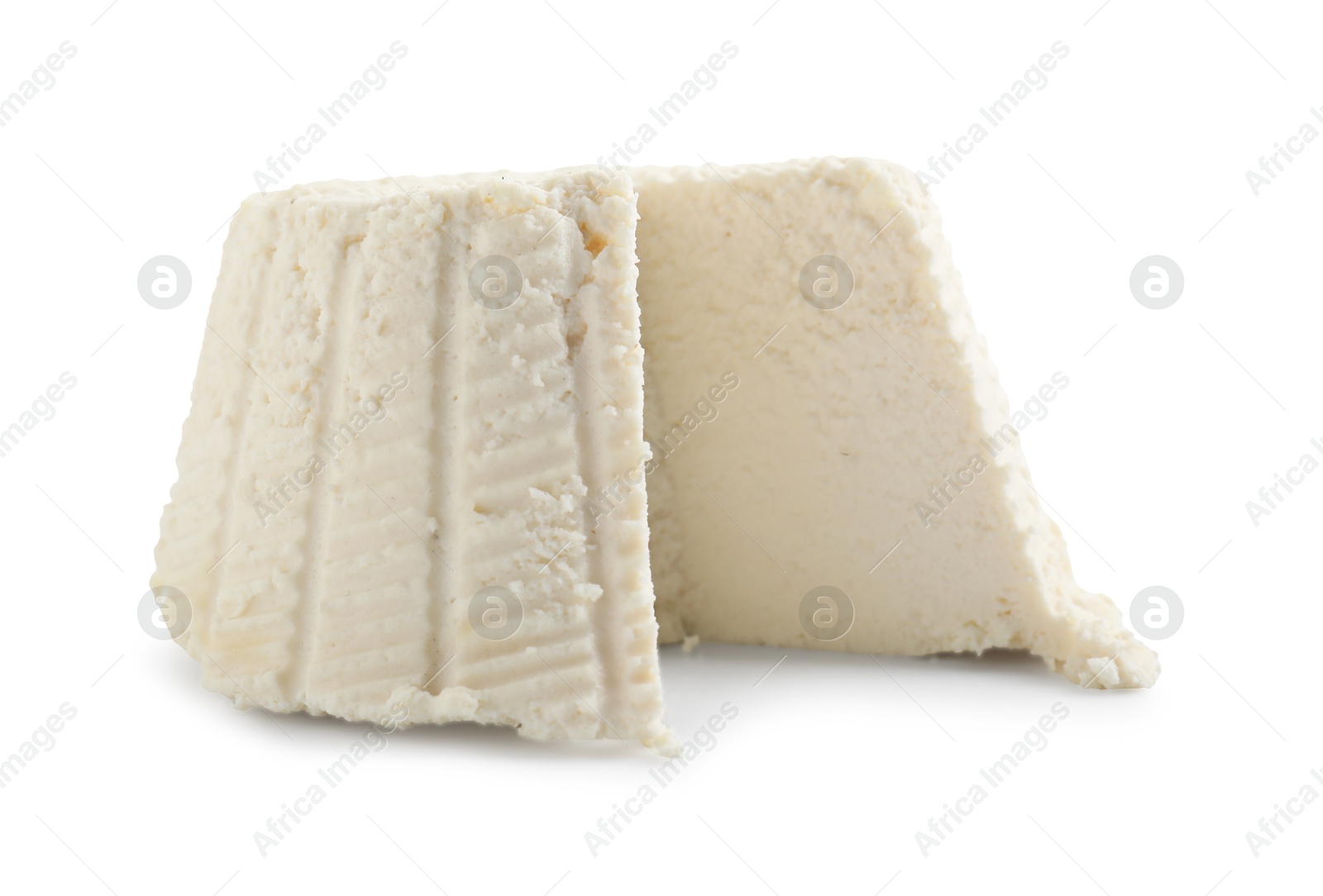 Photo of Fresh cut ricotta (cream cheese) isolated on white