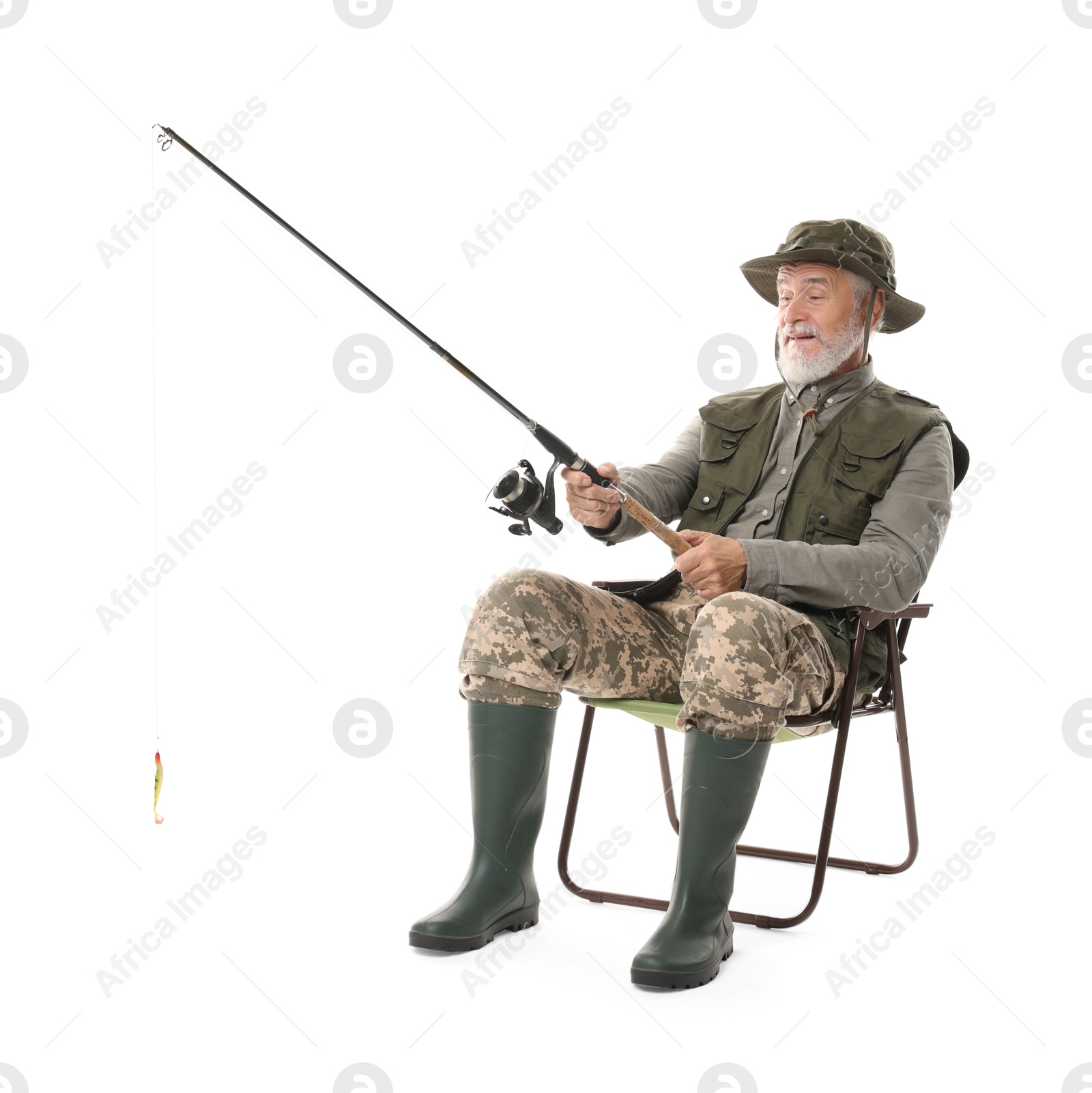 Photo of Fisherman with rod on fishing chair against white background