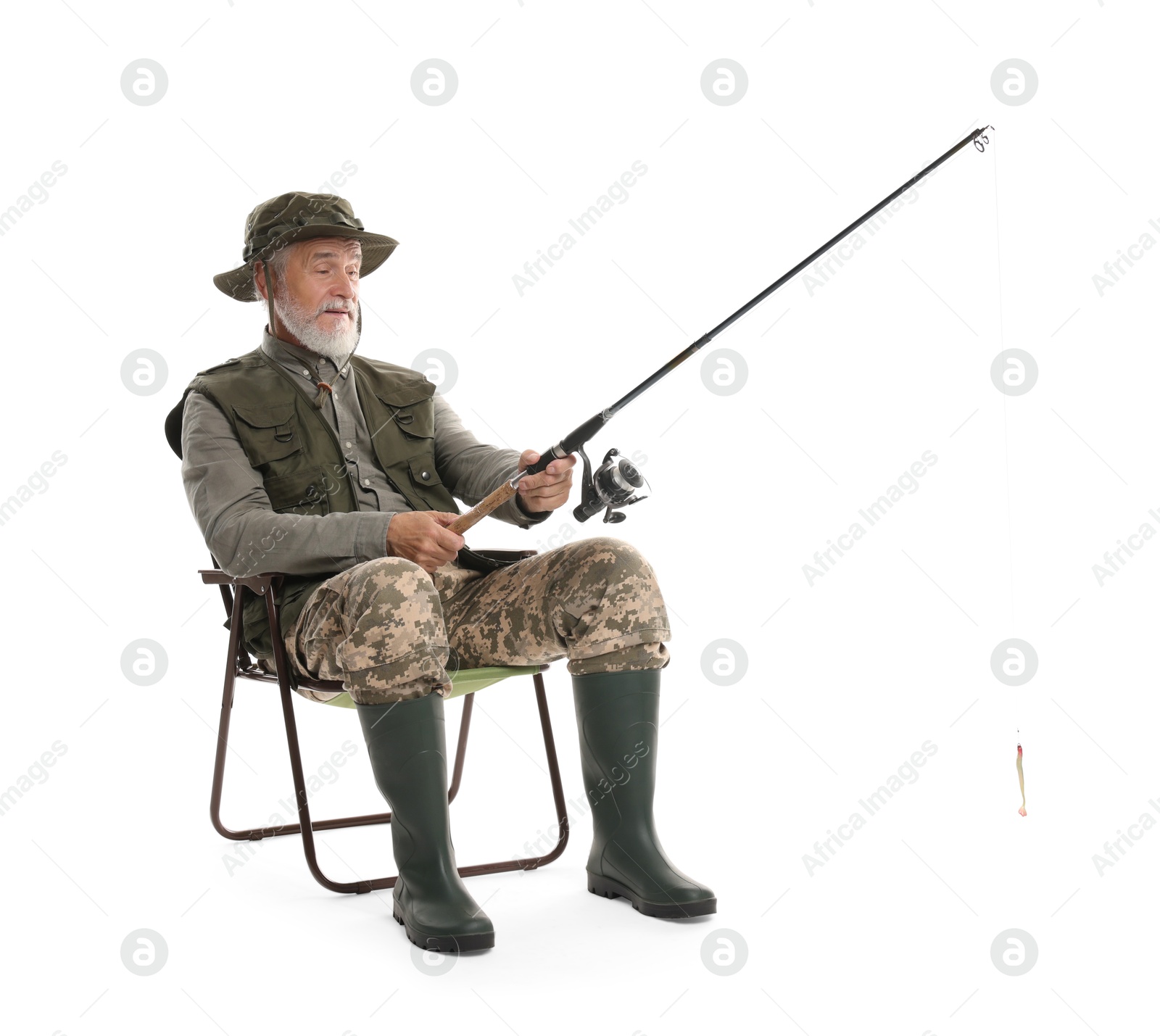 Photo of Fisherman with rod on fishing chair against white background