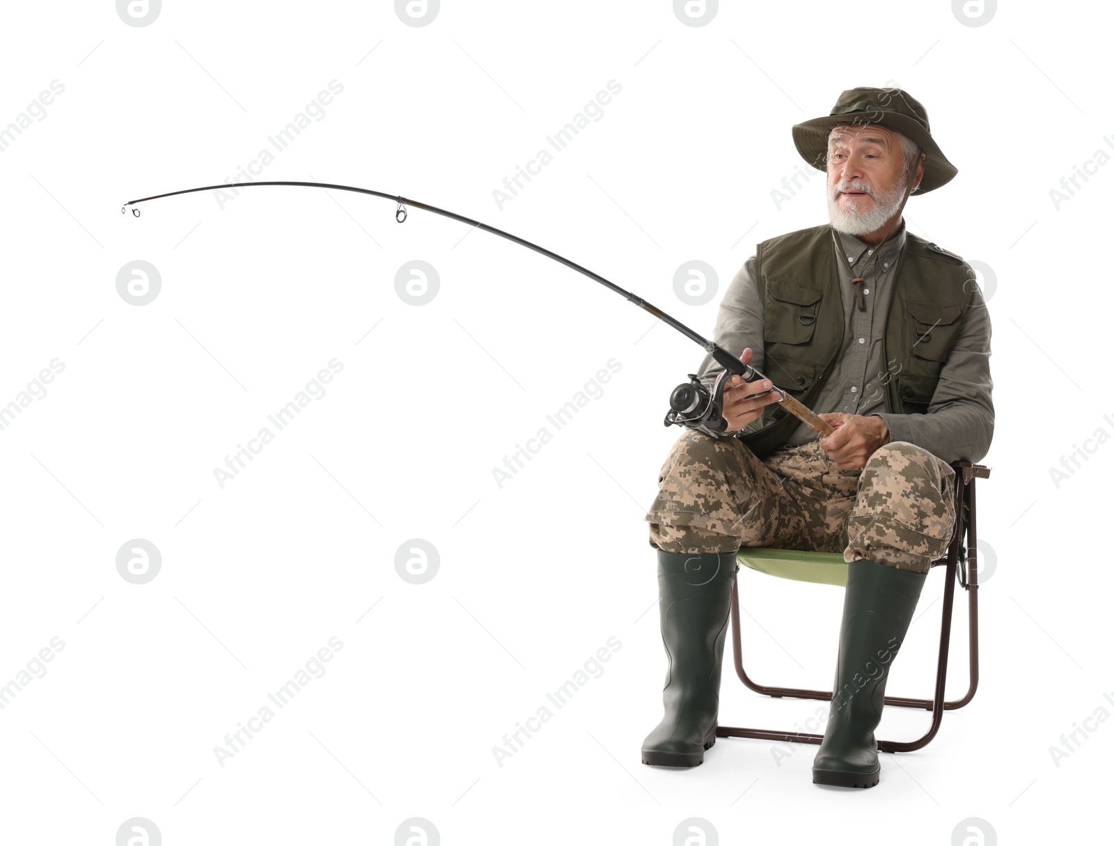 Photo of Fisherman with rod on fishing chair against white background