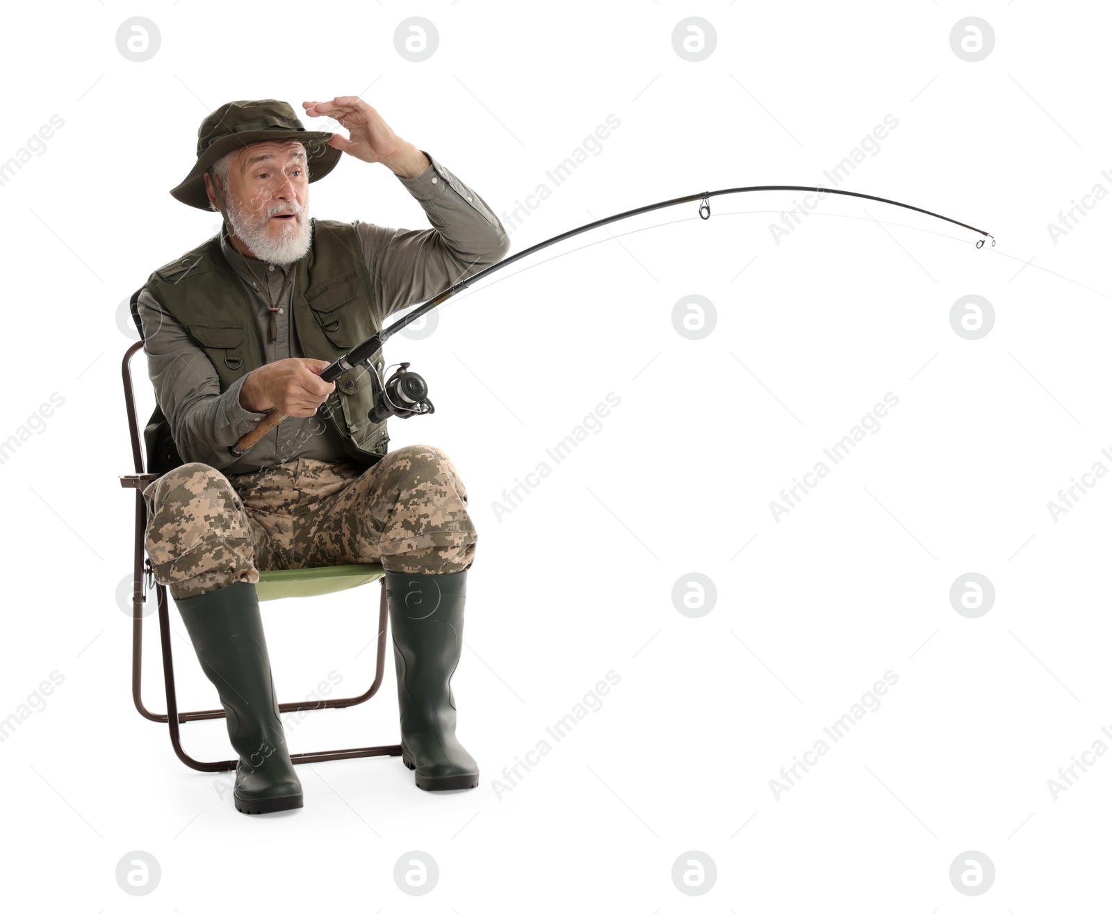 Photo of Fisherman with rod on fishing chair against white background