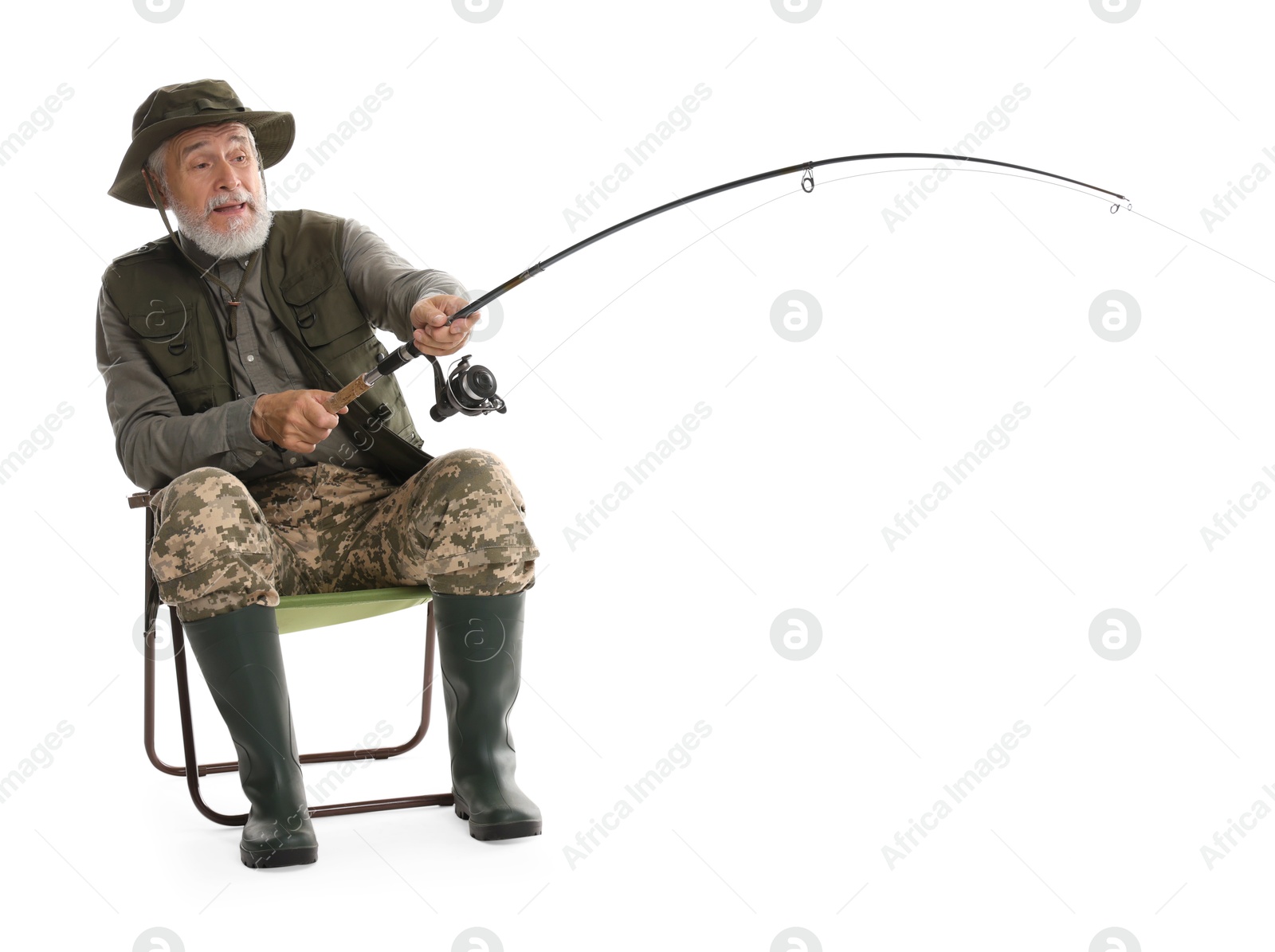 Photo of Fisherman with rod on fishing chair against white background