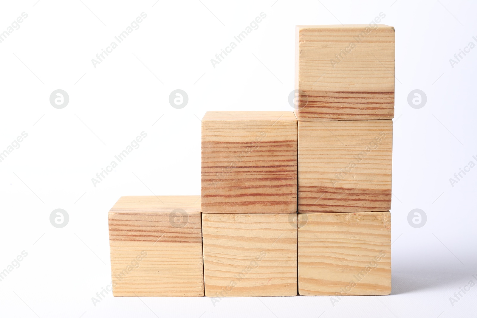 Photo of Many blank wooden cubes on white background