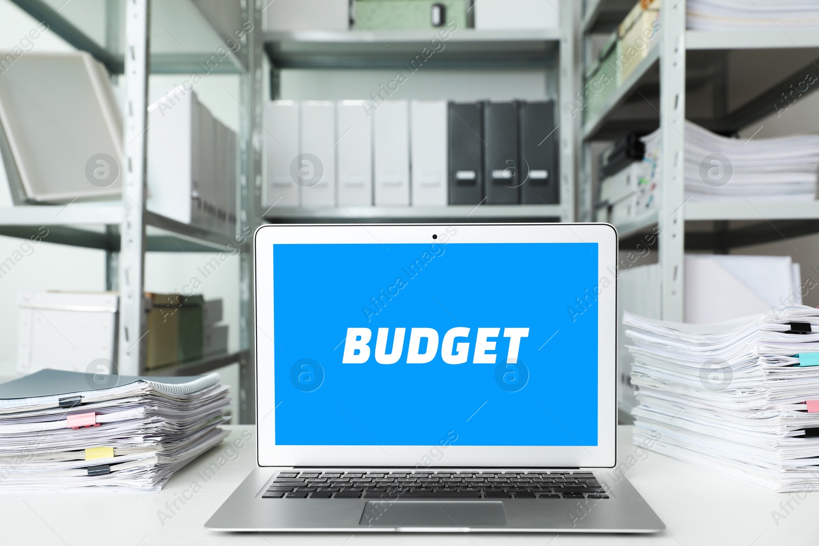 Image of Budget word on laptop screen in office