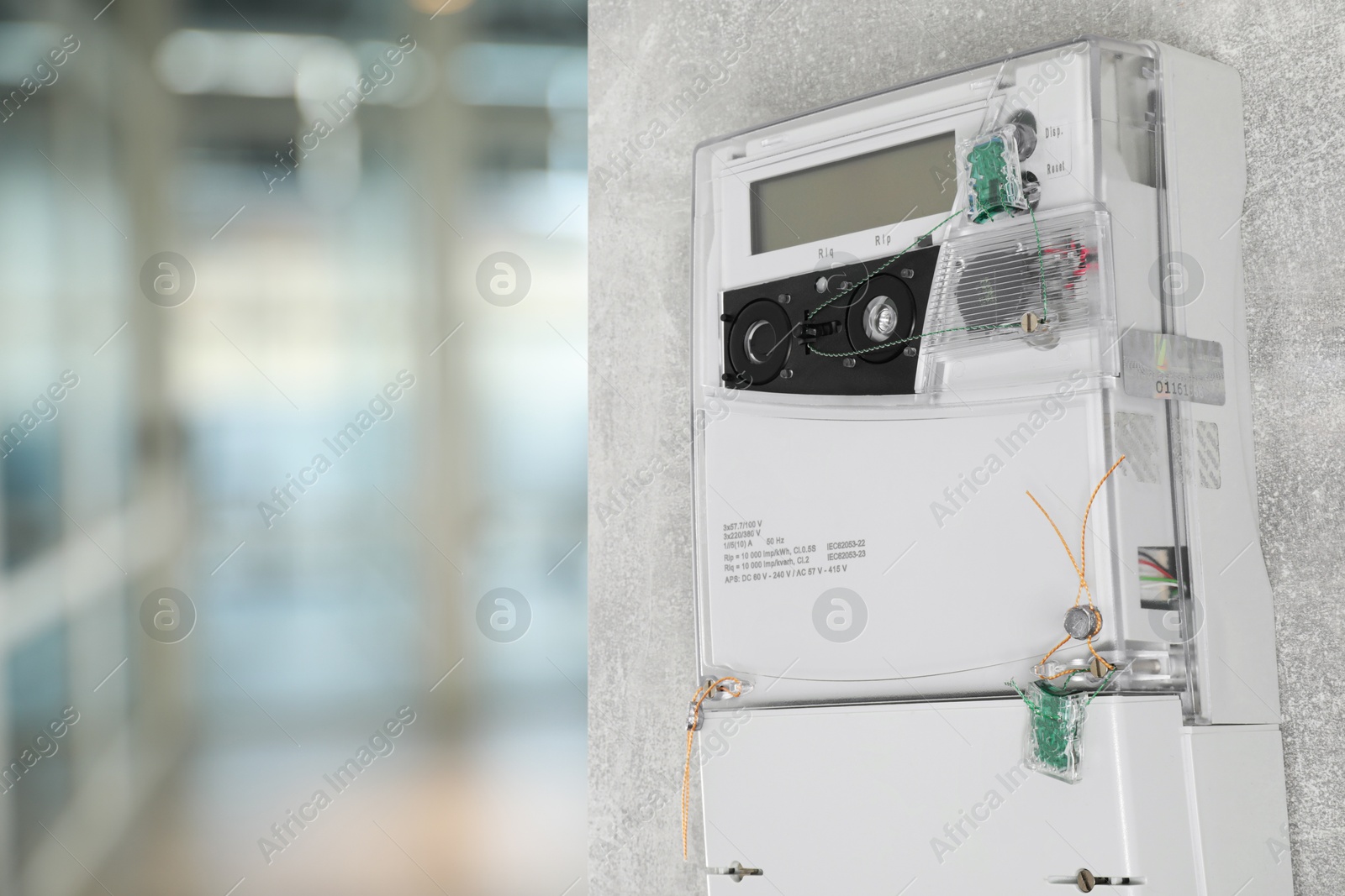 Image of Electricity meter indoors, space for text. Measuring device