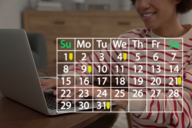 Image of Woman making timetable in laptop at home, closeup. Virtual calendar with marked dates in foreground