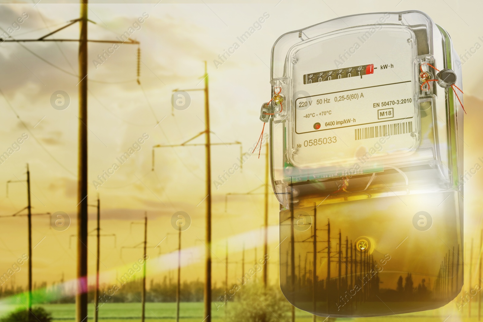 Image of Electricity meter and poles with cables, double exposure