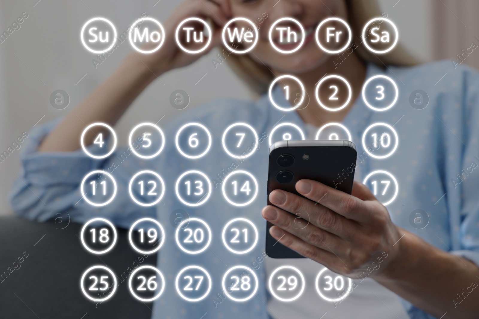 Image of Making timetable. Woman using smartphone, closeup. Virtual calendar between her and device