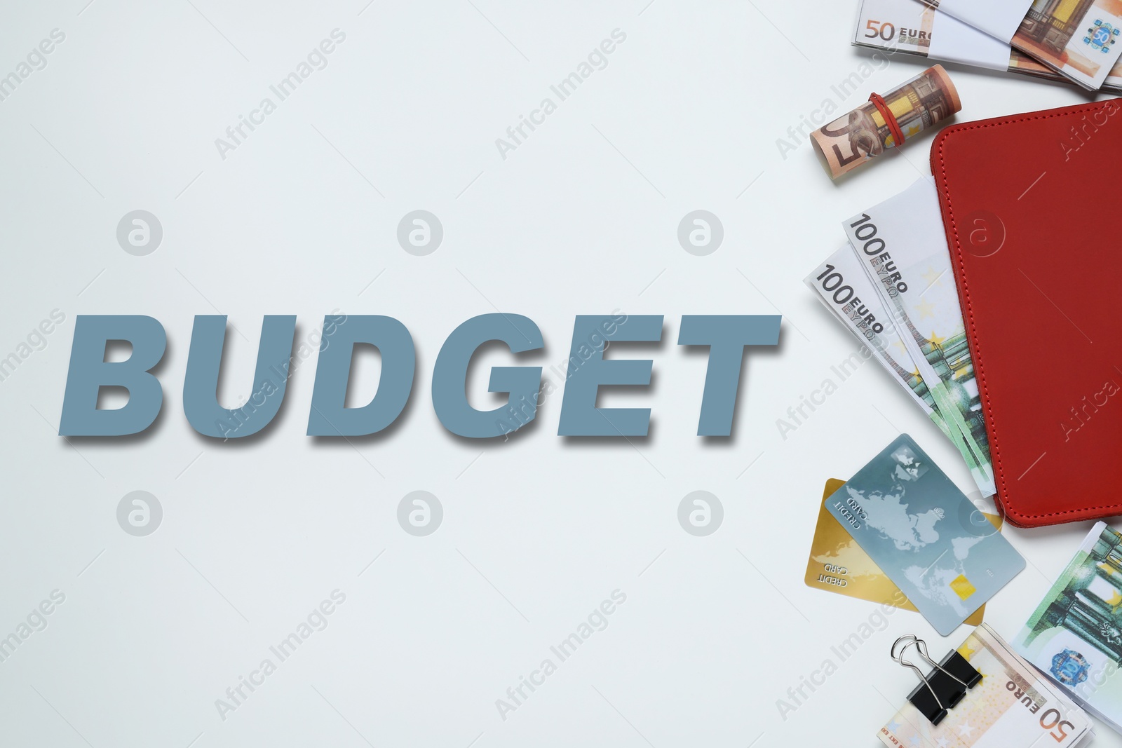 Image of Word Budget and different banknotes on white background, top view