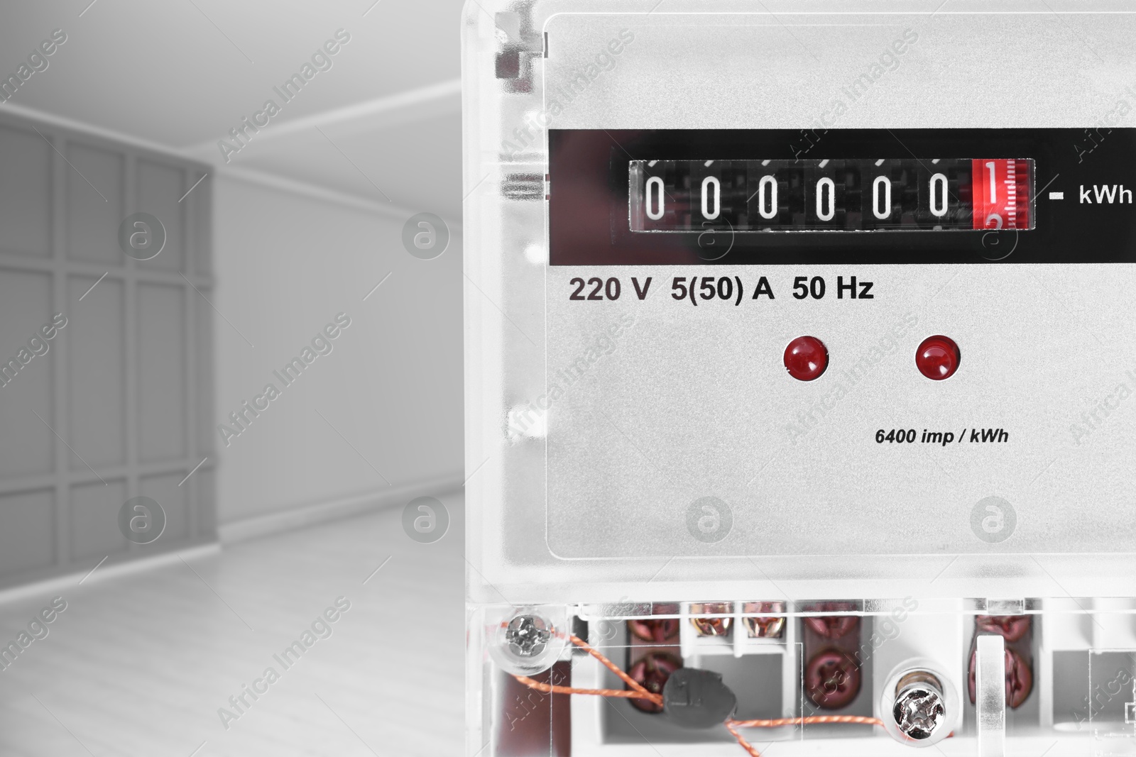 Image of Electricity meter indoors, space for text. Measuring device