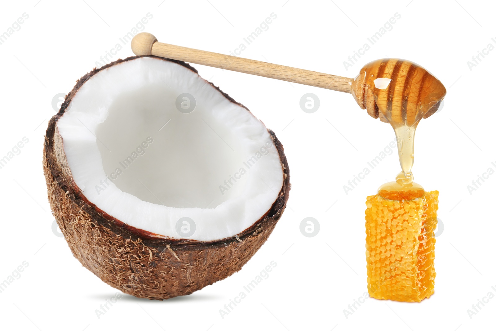 Image of Coconut, wooden dipper with honey and honeycomb isolated on white