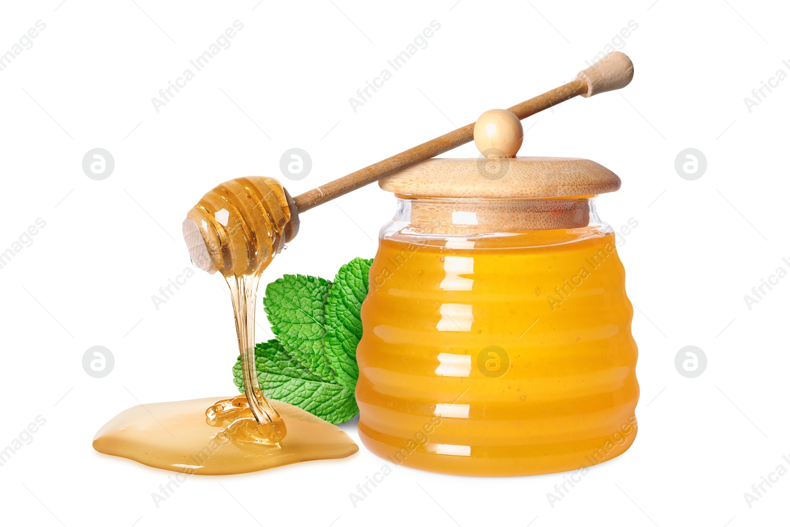 Image of Jar and dipper with honey isolated on white