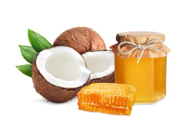 Image of Coconuts, jar of honey and honeycomb isolated on white