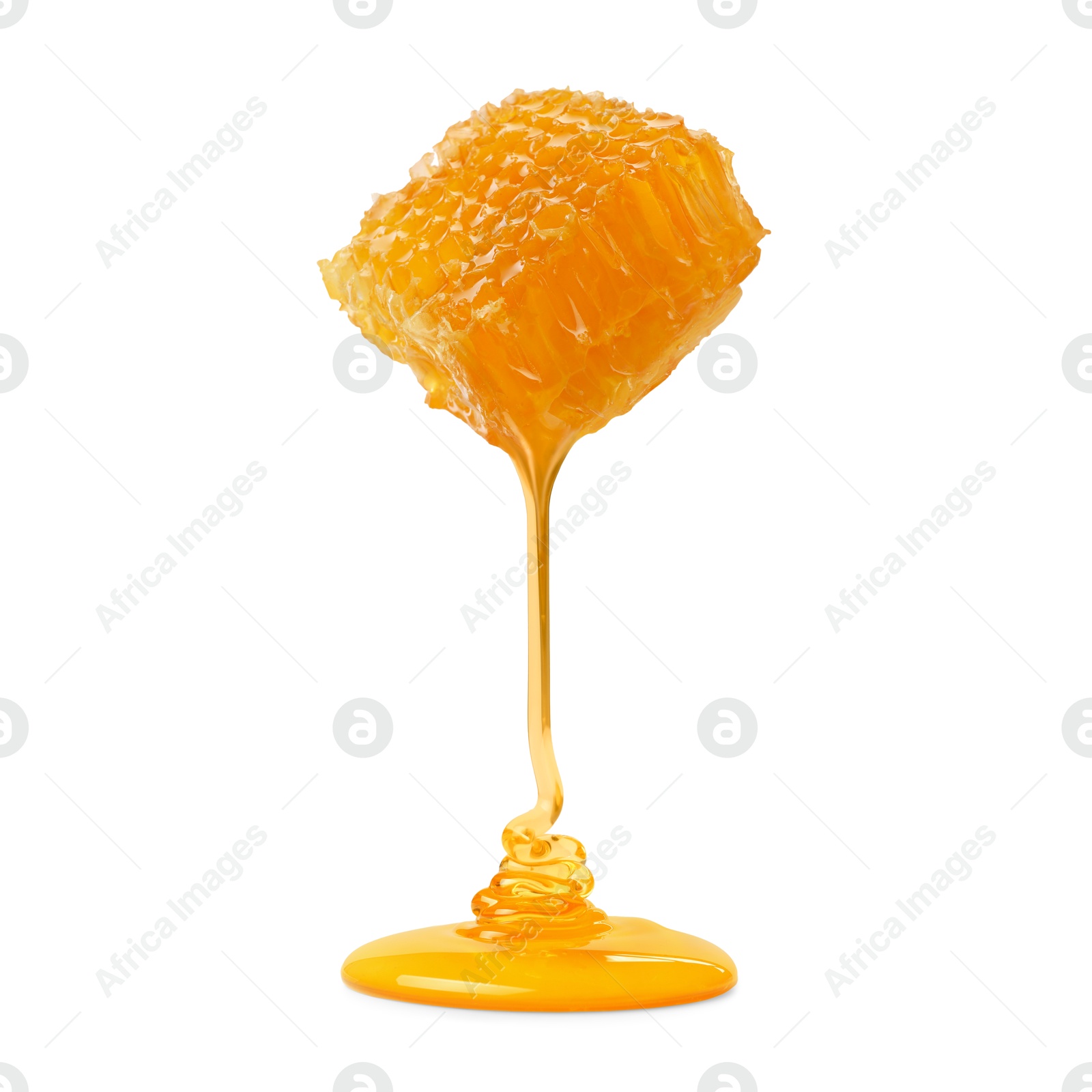 Image of Honey dripping from honeycomb on white background