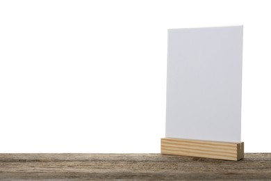 Photo of Menu holder on wooden table against white background. Space for text