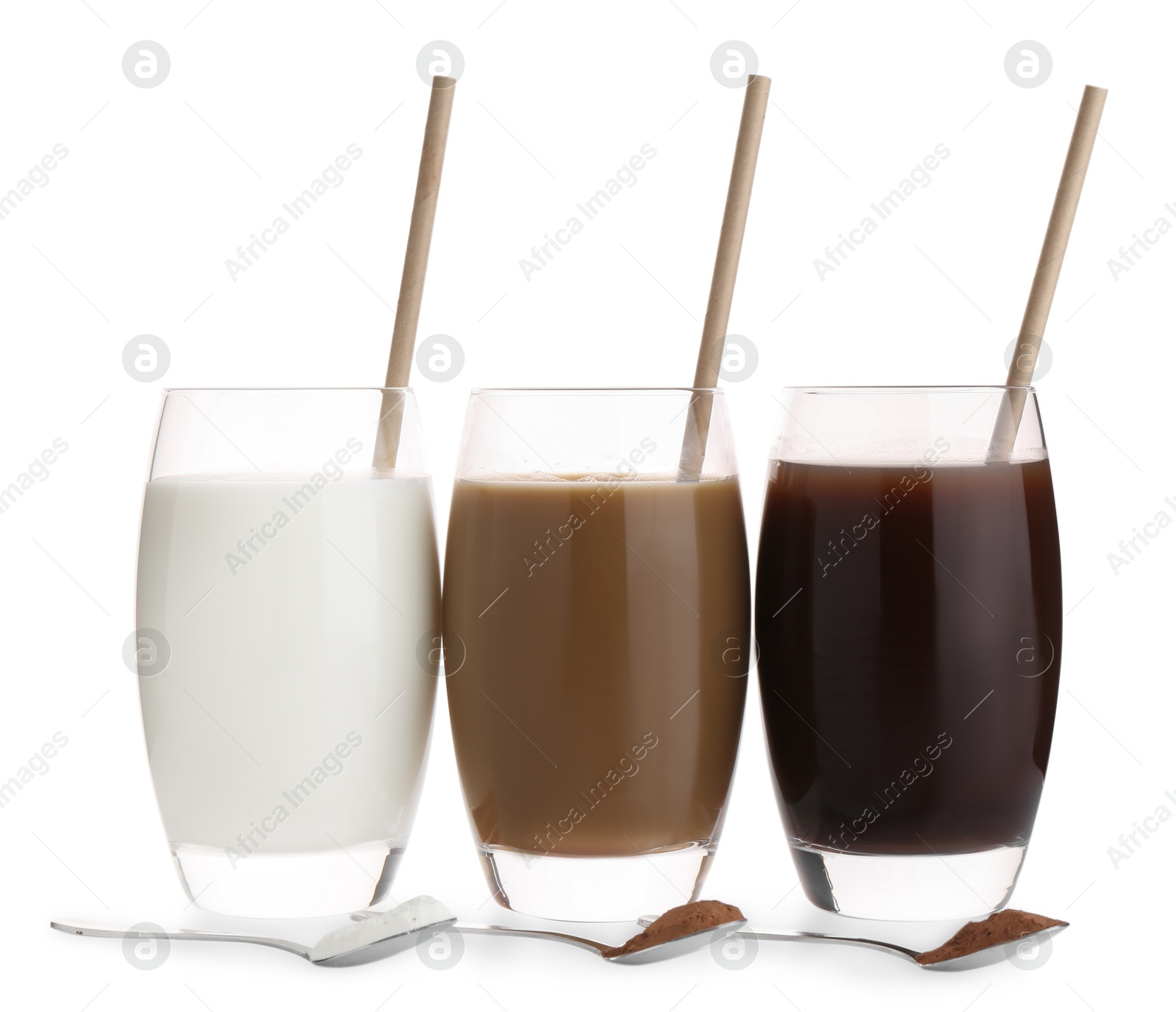 Photo of Delicious protein shakes in glasses and spoons with powder isolated on white