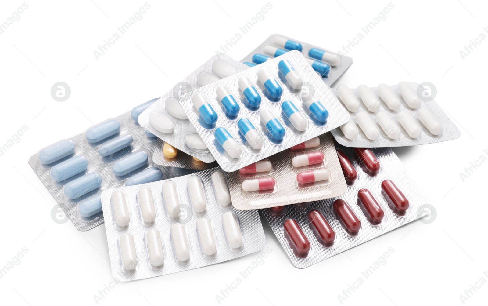 Photo of Different antibiotic pills in blisters isolated on white