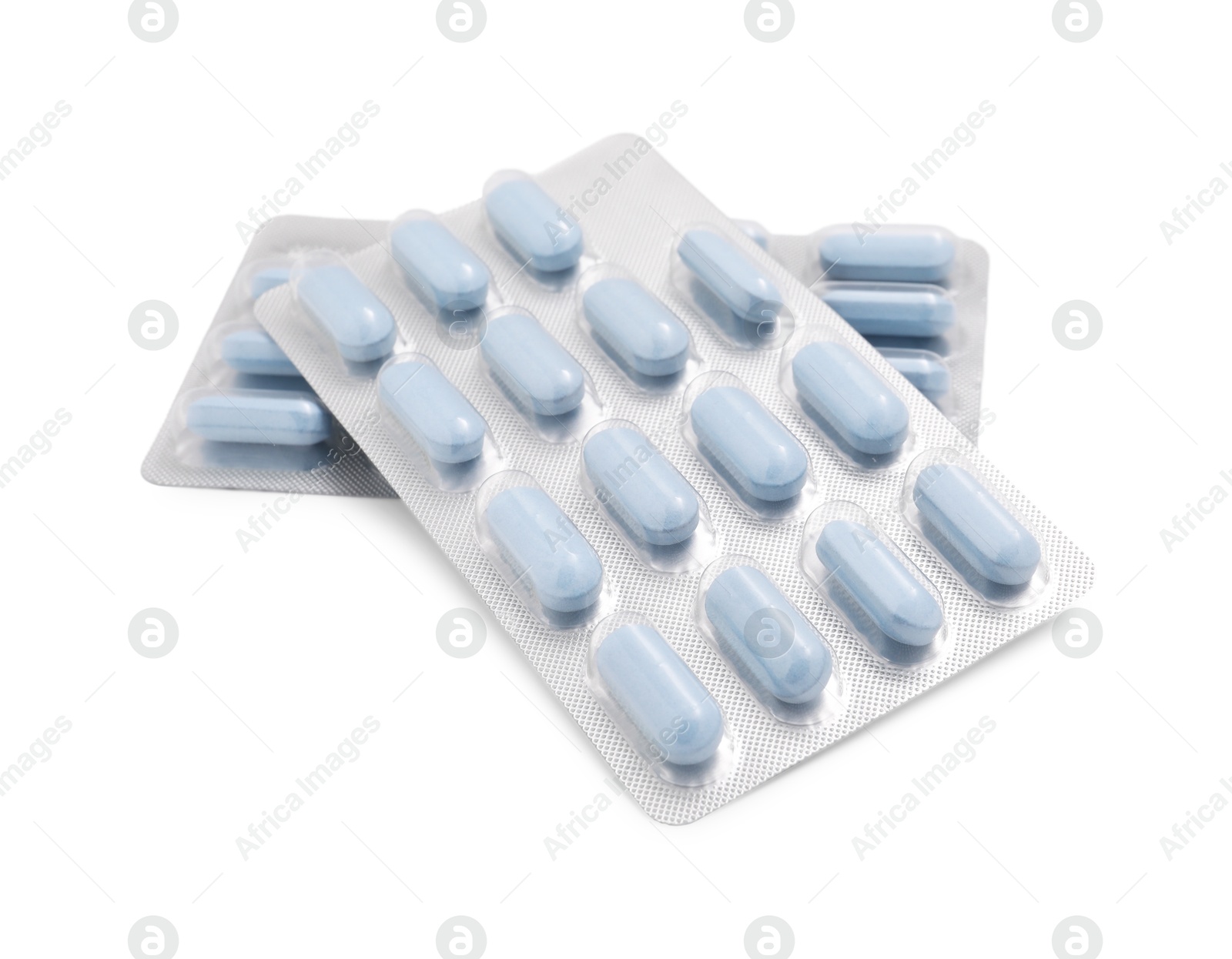 Photo of Antibiotic pills in blisters isolated on white