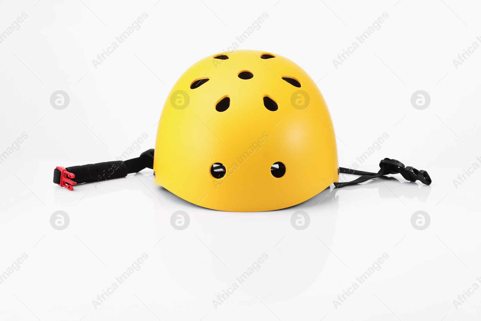 Photo of One yellow protective helmet on white background