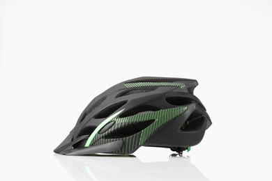 Photo of One new protective helmet on white background