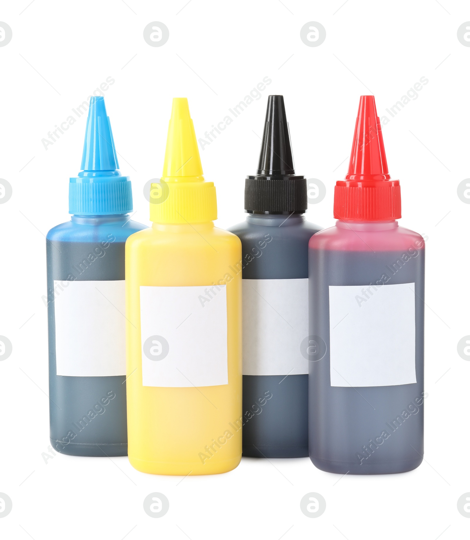 Photo of Bottles of different printer ink isolated on white