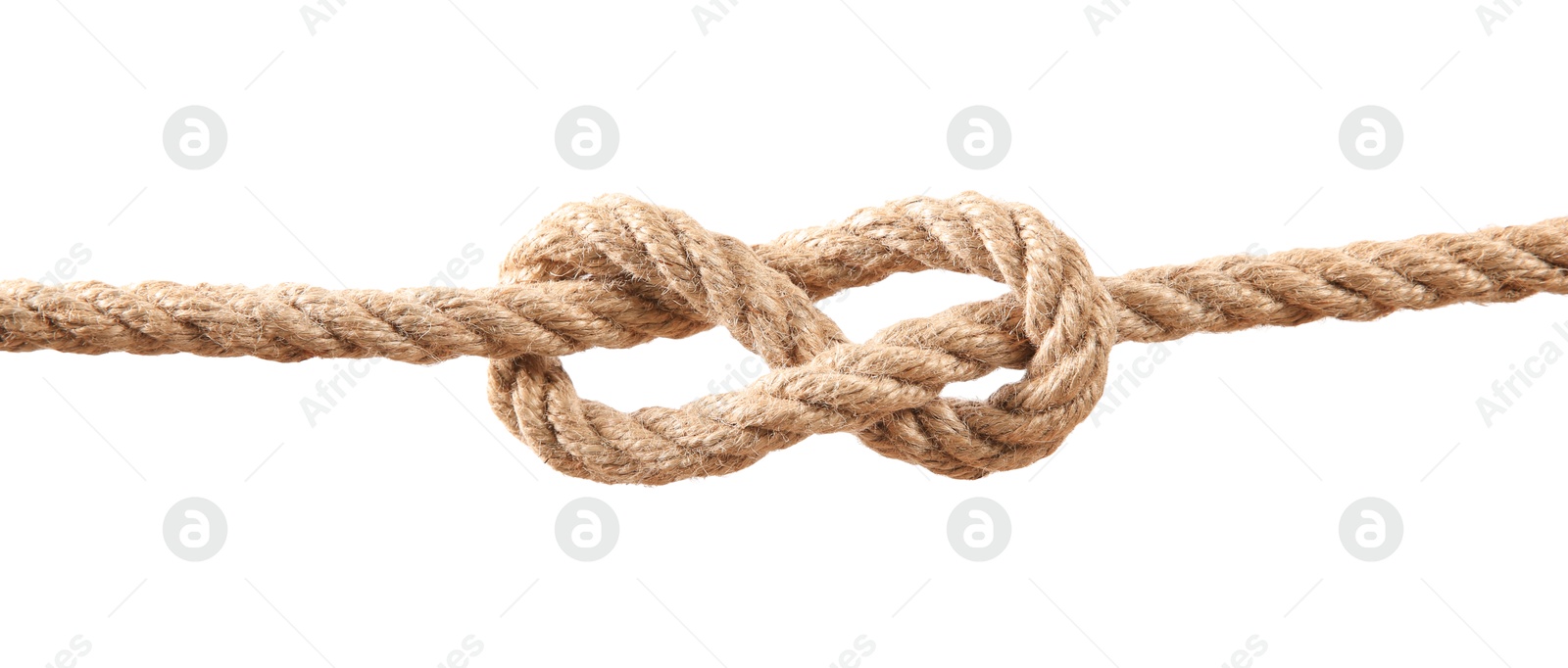 Photo of Hemp rope with knot on white background