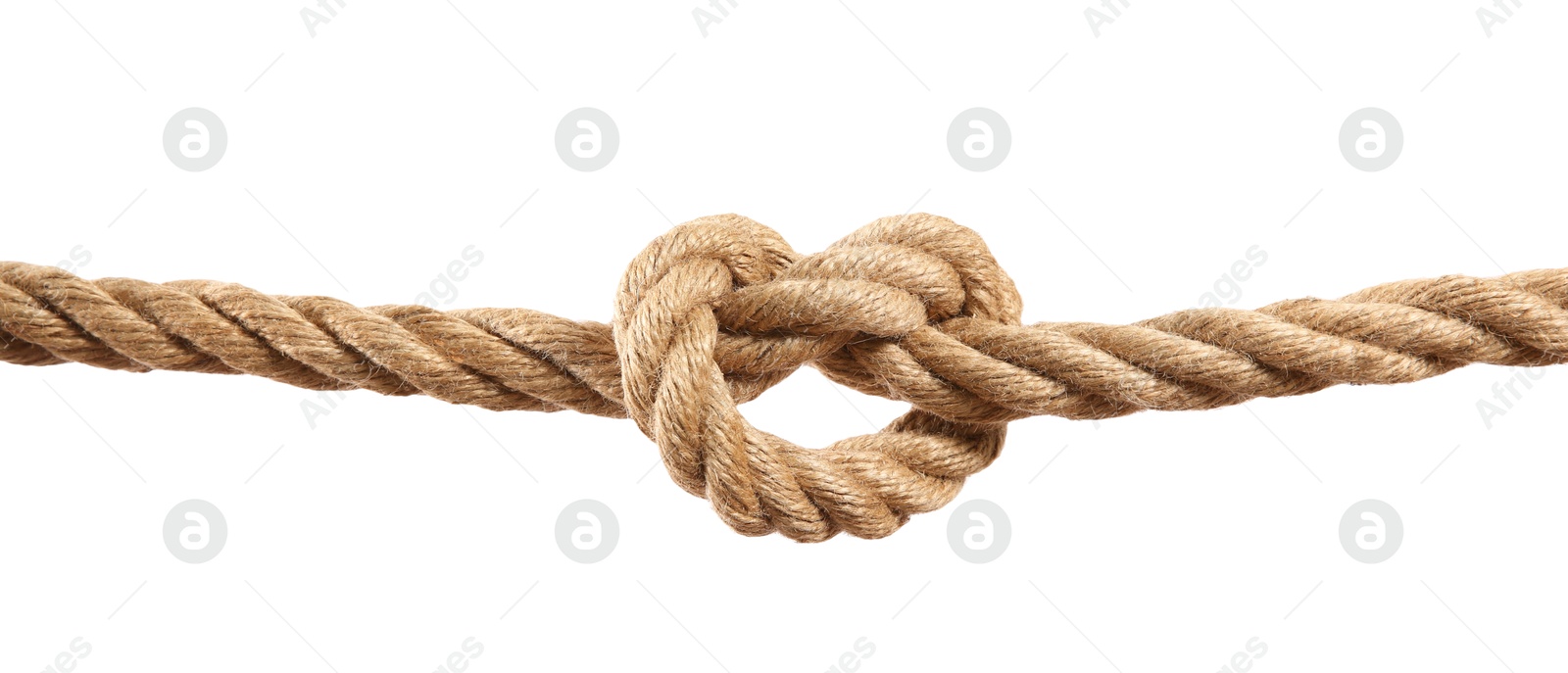 Photo of Hemp rope with knot on white background