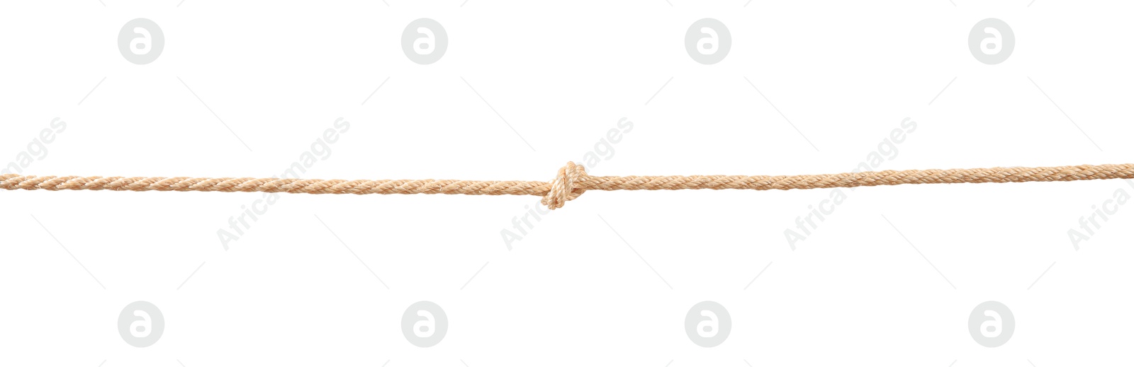 Photo of Hemp rope with knot on white background