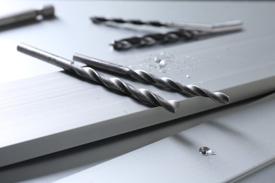 Photo of Bits and planks on light table, closeup