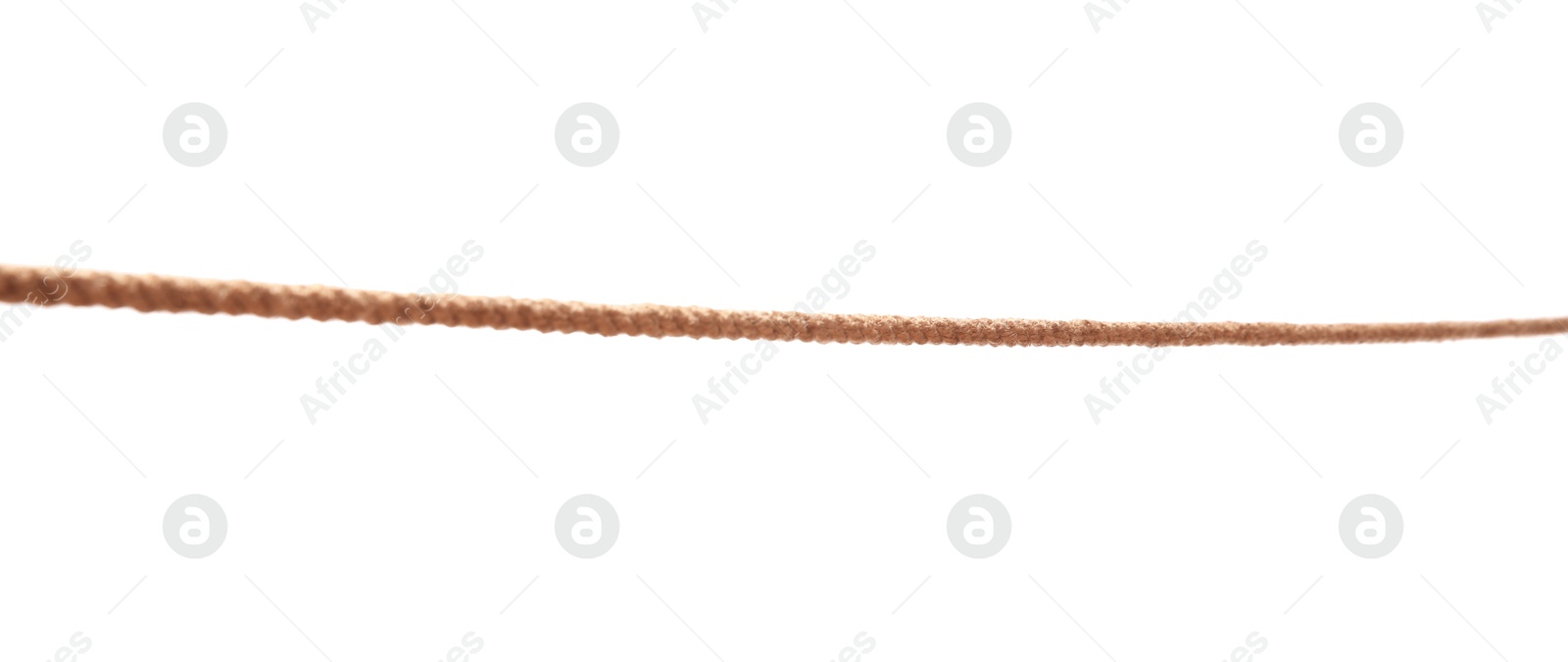 Photo of One brown braided rope isolated on white