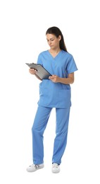 Photo of Beautiful nurse with clipboard on white background
