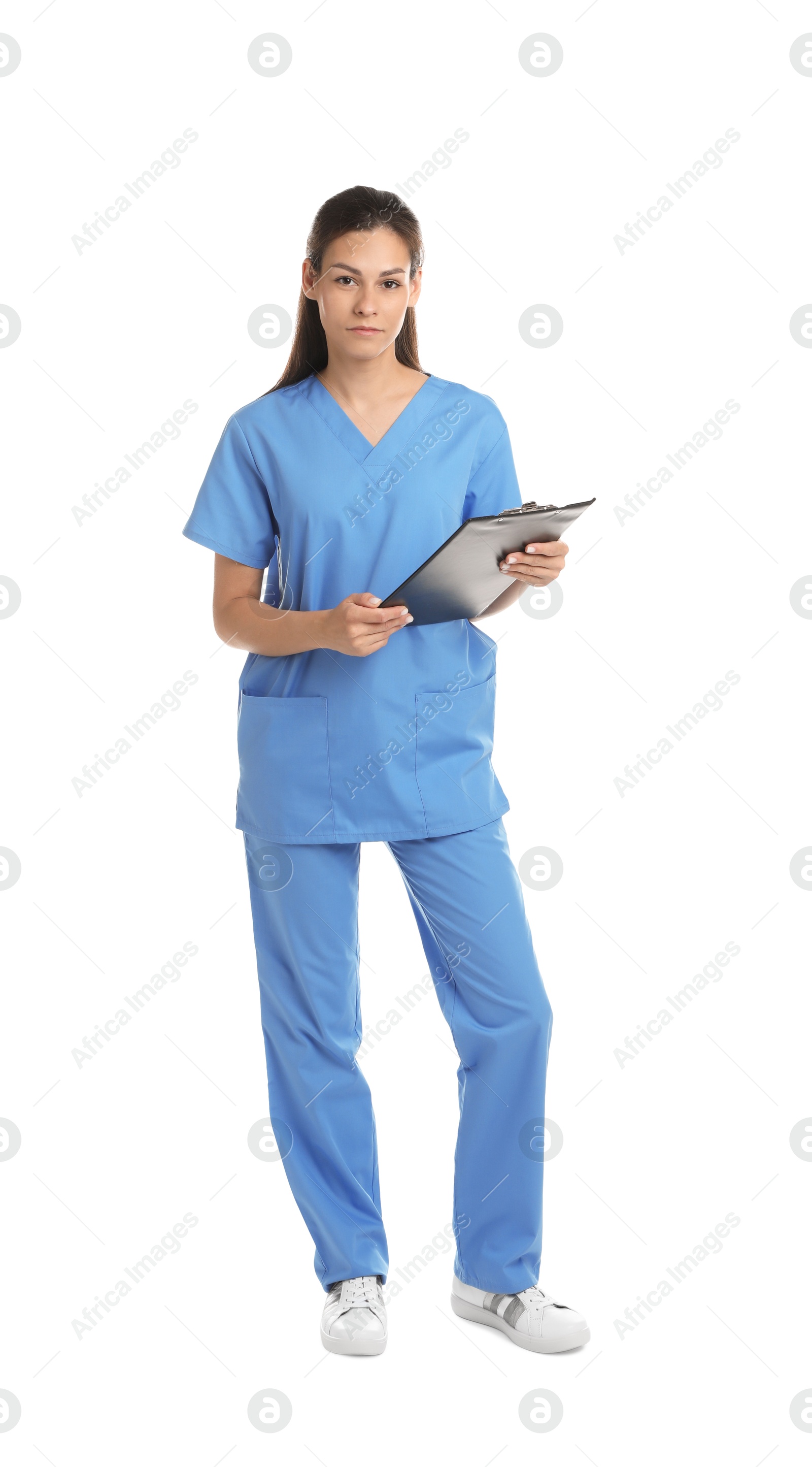 Photo of Beautiful nurse with clipboard on white background