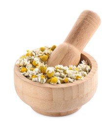 Mortar and pestle with chamomile flowers isolated on white