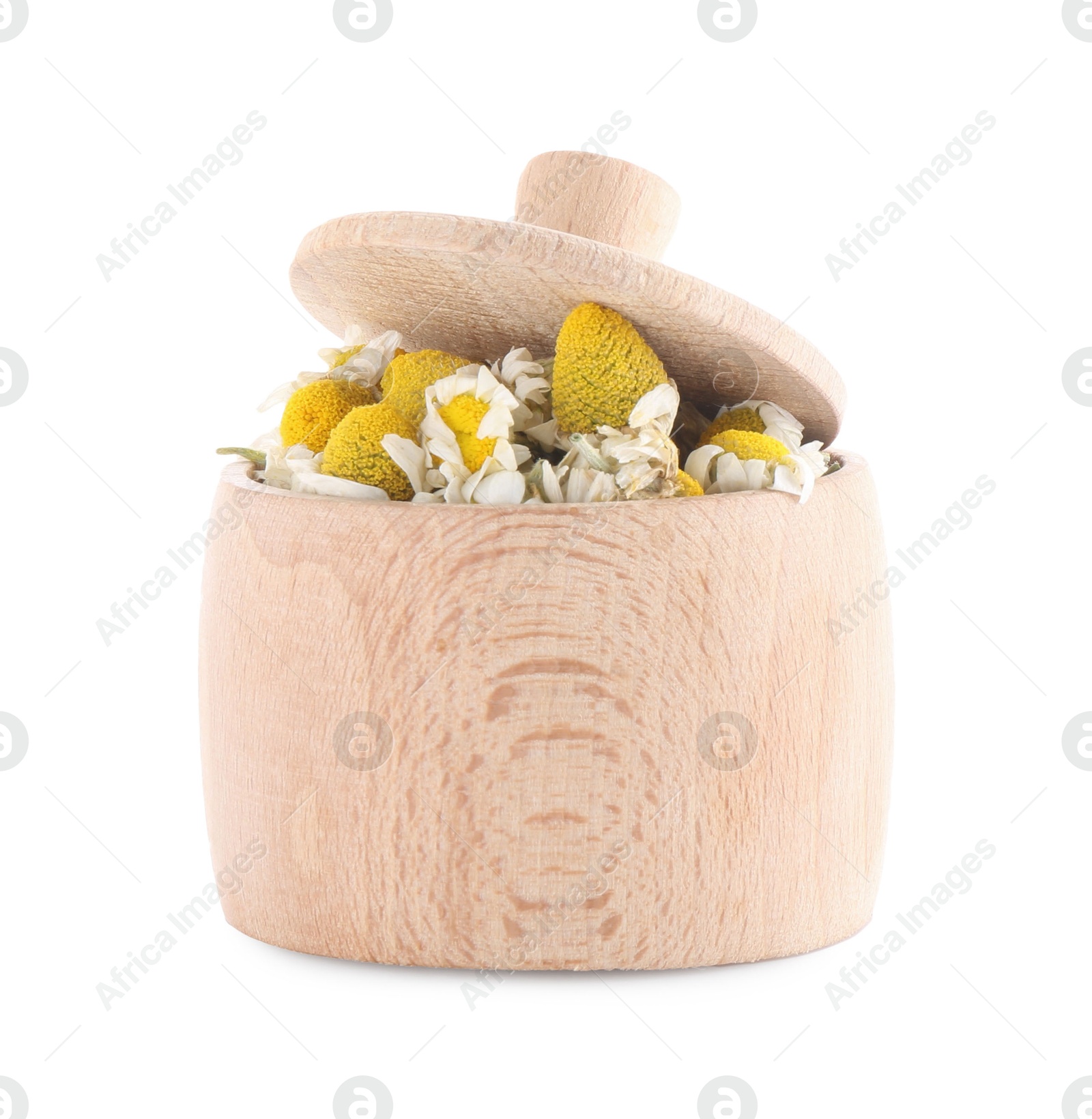 Photo of Chamomile flowers in wooden bowl isolated on white