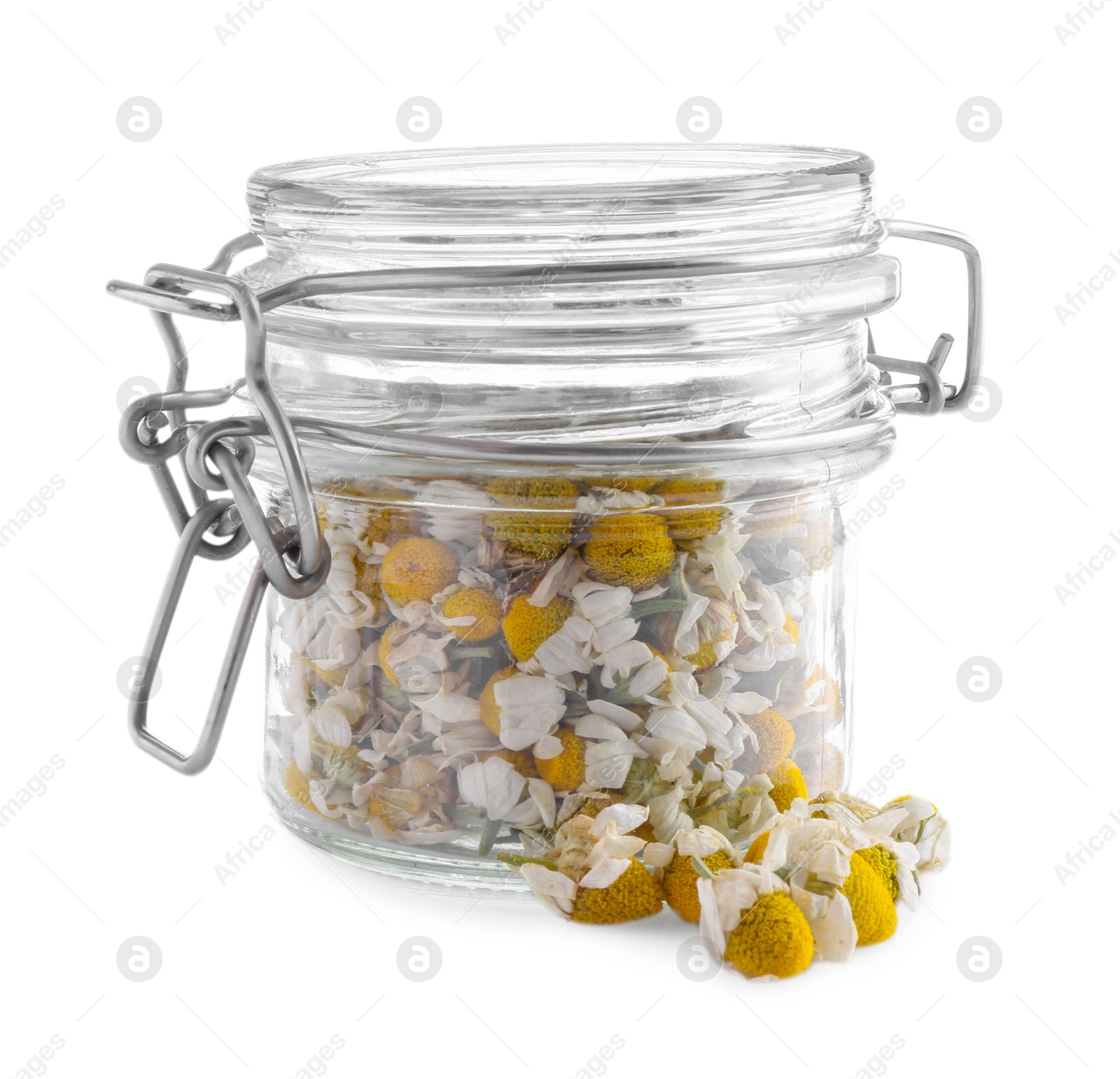 Photo of Chamomile flowers in glass jar isolated on white