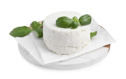 Photo of Fresh ricotta (cream cheese) and basil isolated on white