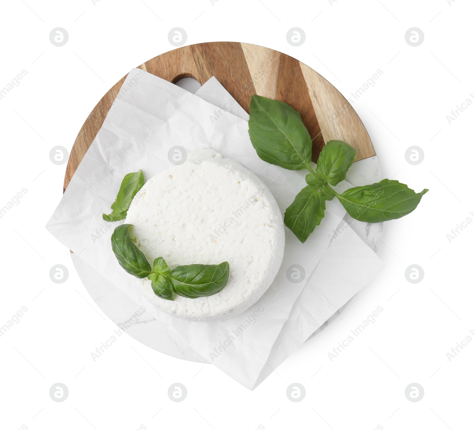 Photo of Fresh ricotta (cream cheese) and basil isolated on white, top view