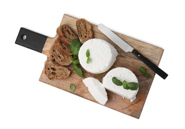 Photo of Fresh ricotta (cream cheese), basil, bread and knife isolated on white, top view