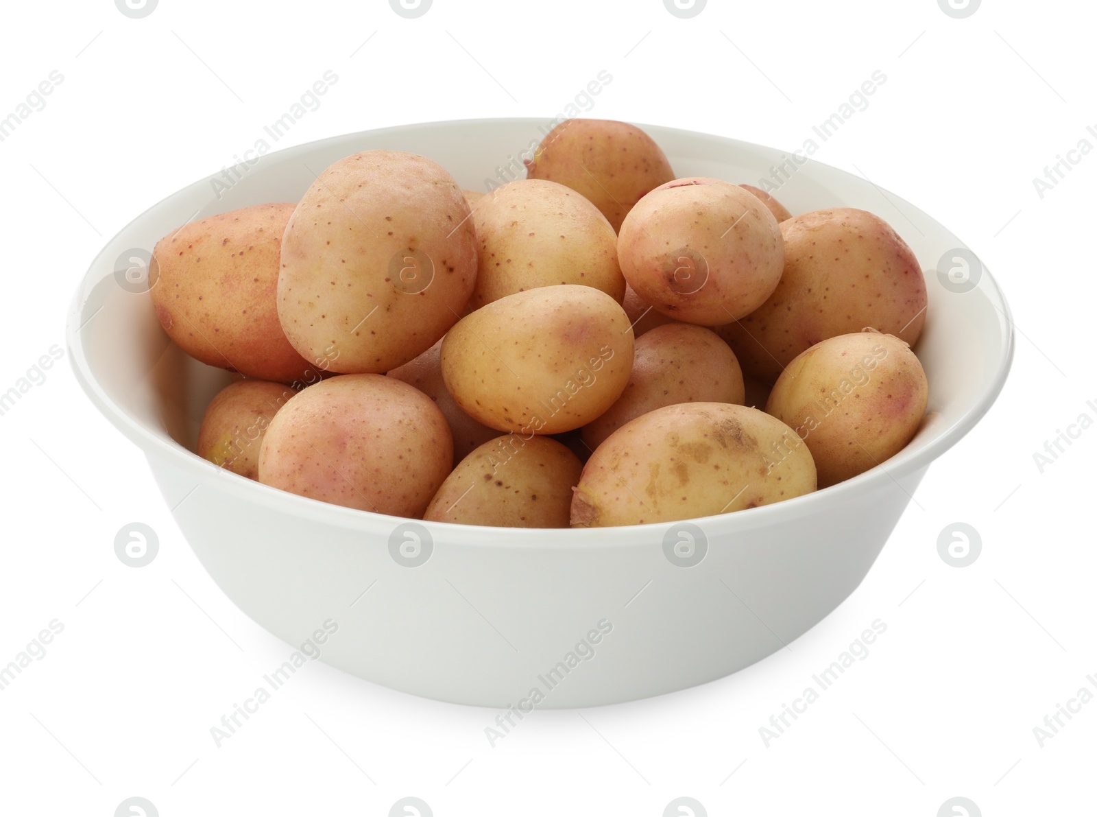 Photo of Raw potatoes in bowl isolated on white