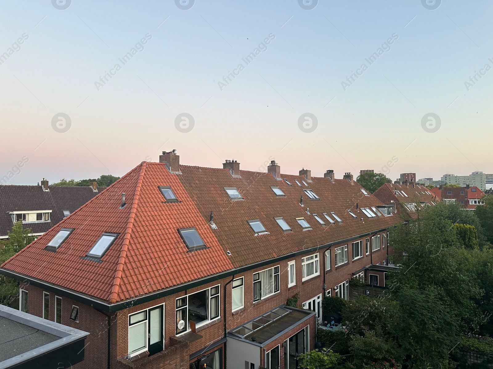 Photo of Beautiful view of city with buildings and trees under sky