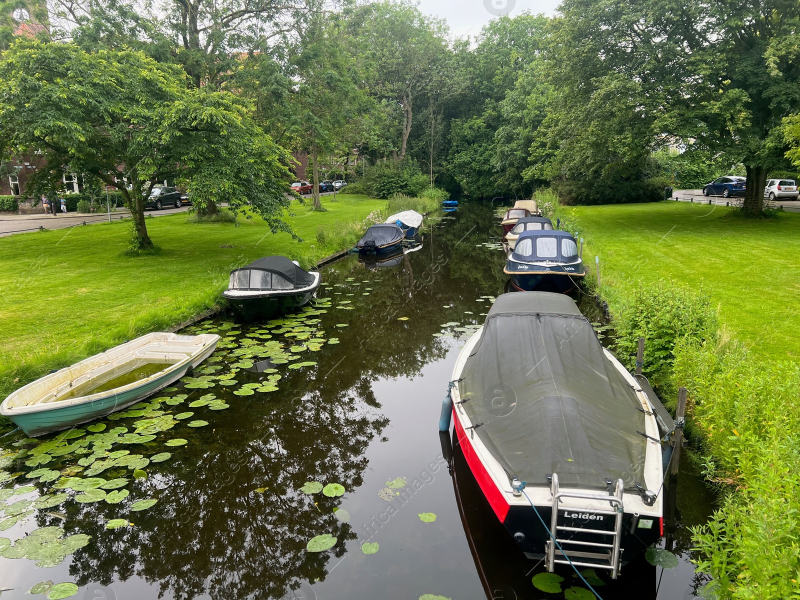 Photo of Picturesque view of canal with moored boats