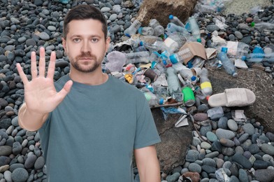 Image of Environmental pollution. Man showing stop gesture among garbage on stones
