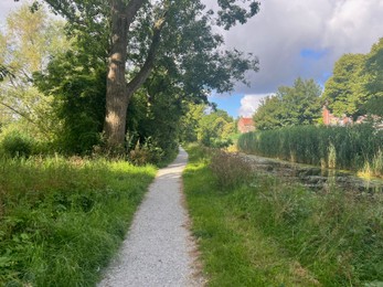 Picturesque view of river, trees and pathway