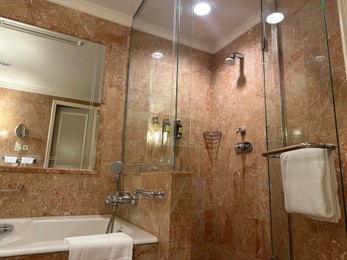 Berlin, Germany - July 2, 2024: Stylish bathroom in Regent Berlin Hotel