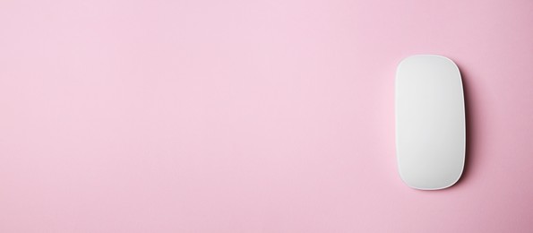 Image of Computer mouse on pink background, top view. Banner design with space for text