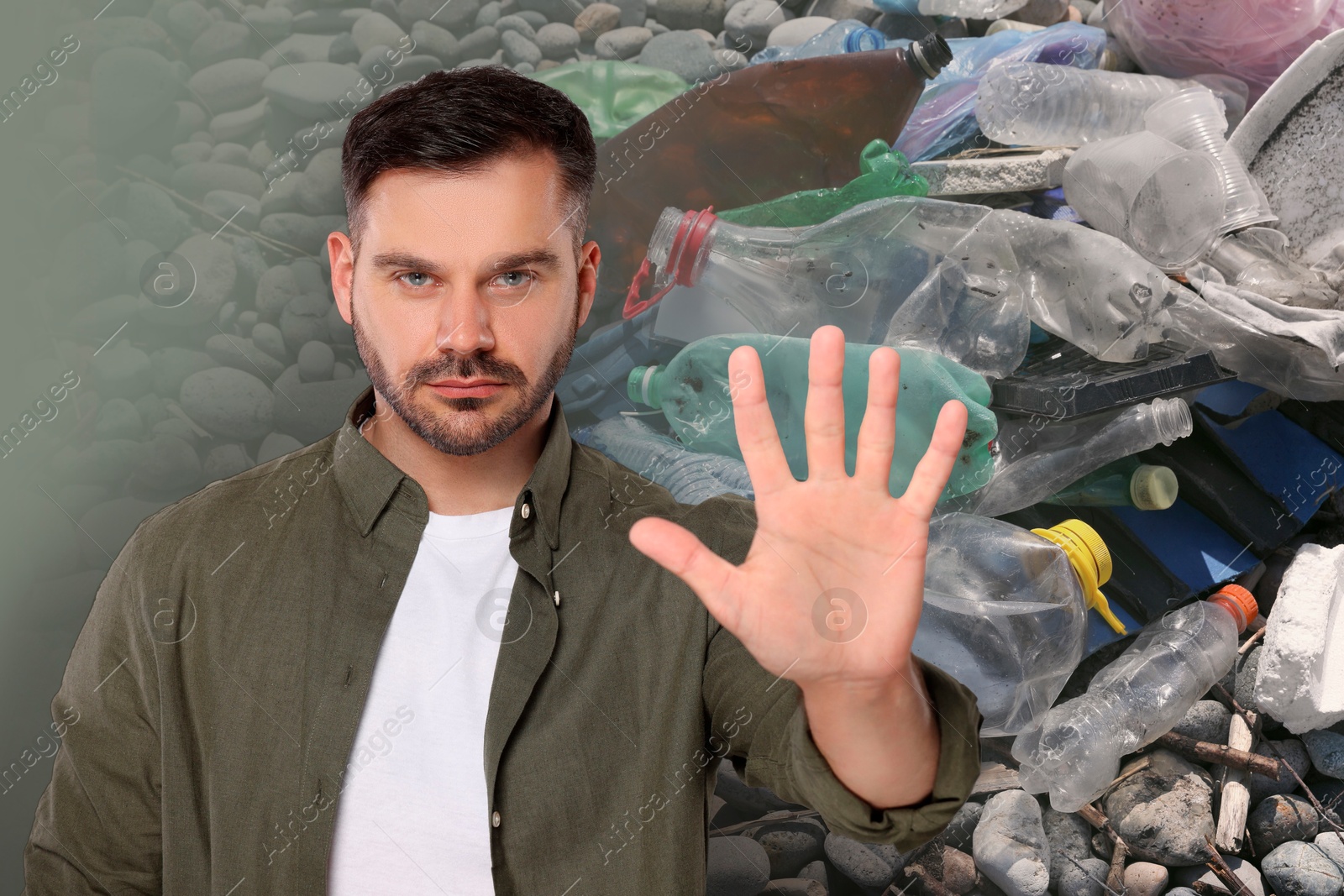 Image of Environmental pollution. Man showing stop gesture among garbage on stones